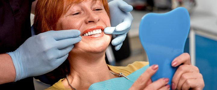 Replacing Missing Teeth: Dentures vs. Dental Implants